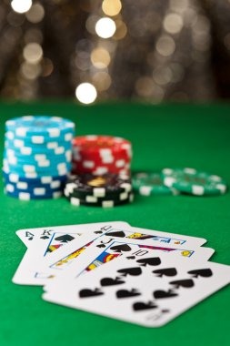 Cambodia Pools live dealer studio with card table and multilingual dealer